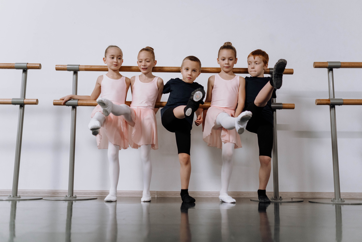 Kids in a Ballet Studio Warming Up  